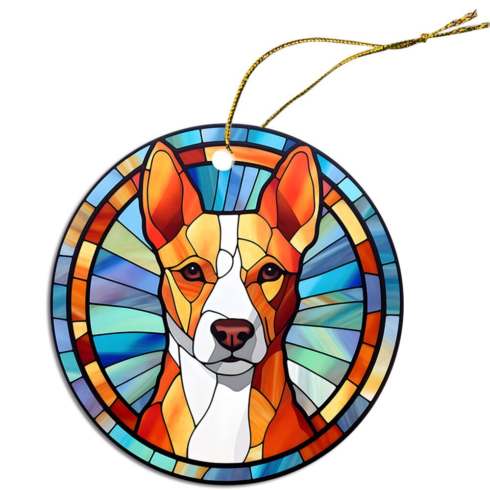 Stained glass style Christmas ornament featuring a Basenji dog breed design, with vibrant colors and an elegant golden string.